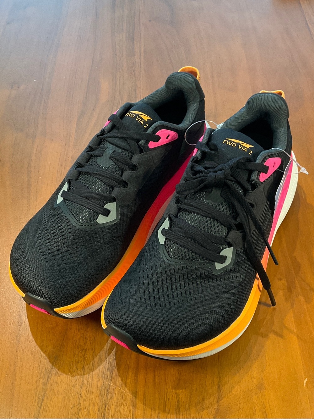 FWD Via 2 Women’s Black Athletic Running Shoes with Pink & Orange Accents sample